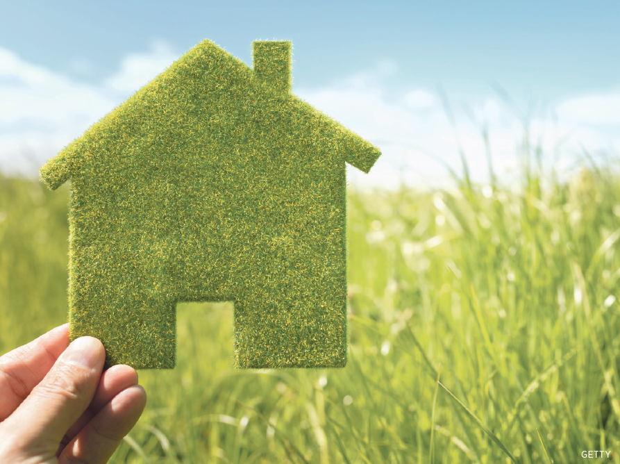 Graphic of a house cutout against a field of grass on a bright day.