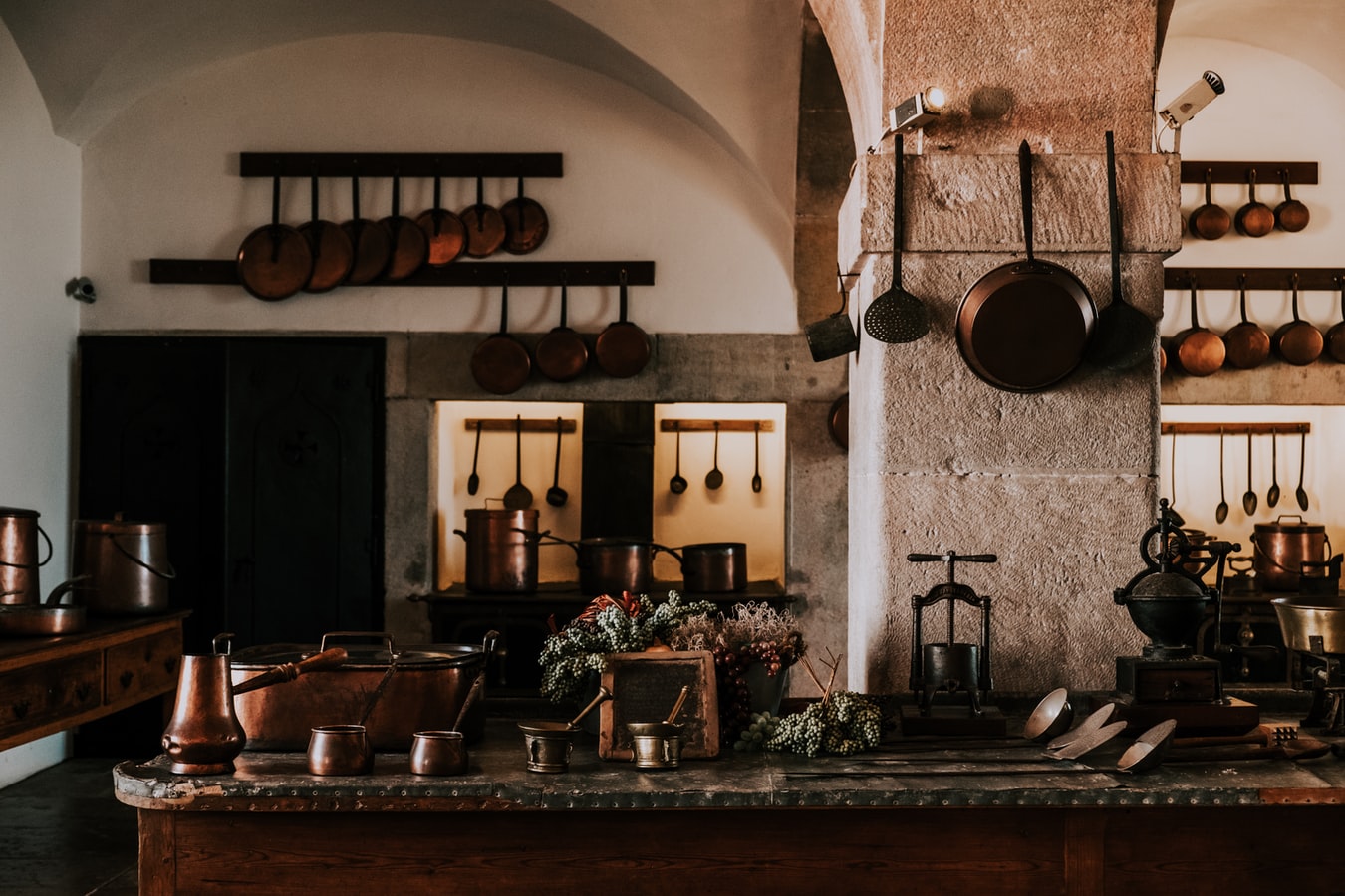 A rustic kitchen with a weathered look.