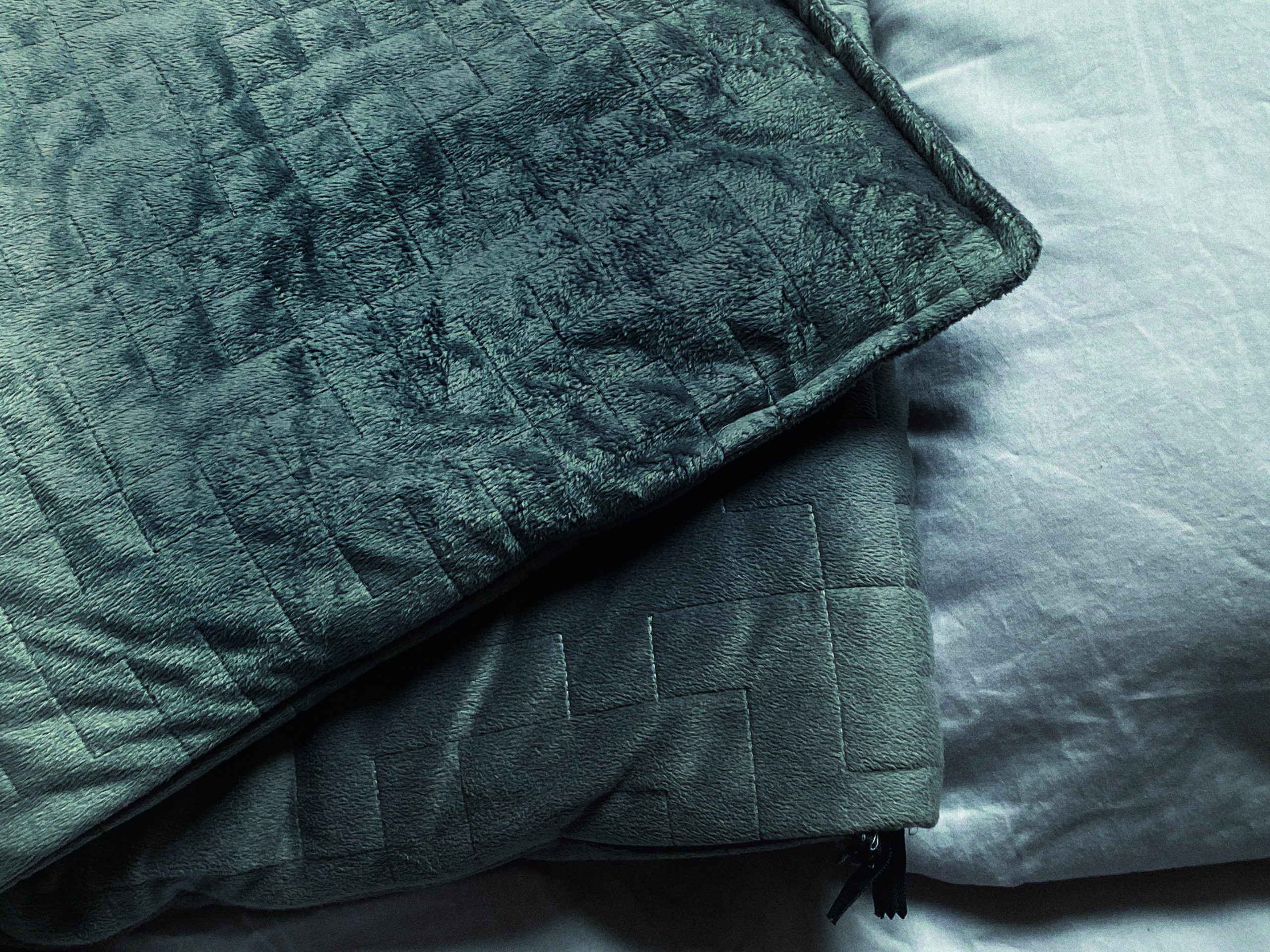 A weighted blanket can help improve the quality of sleep.