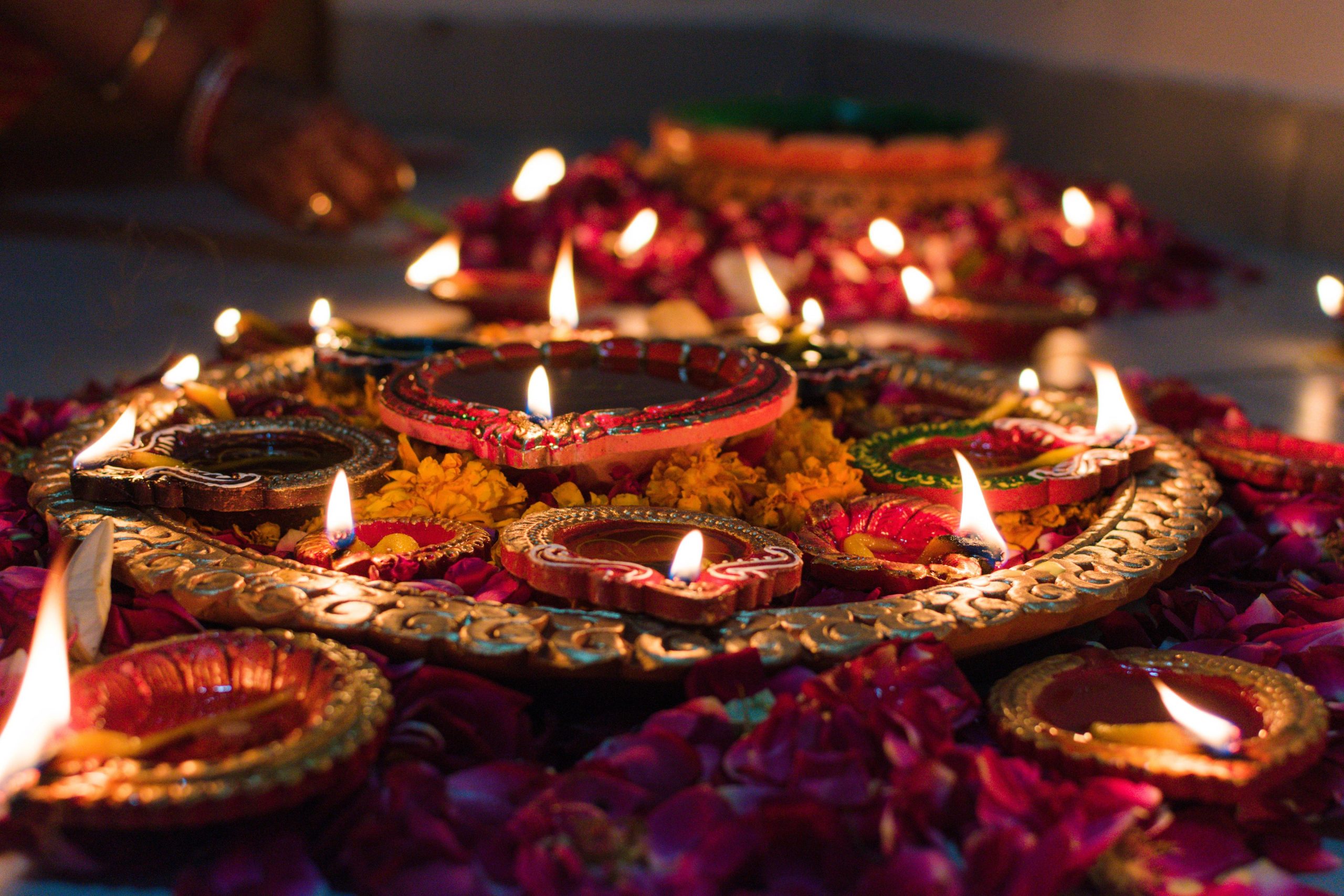 Lit candles during Diwali are said to ward off the darkness and evil