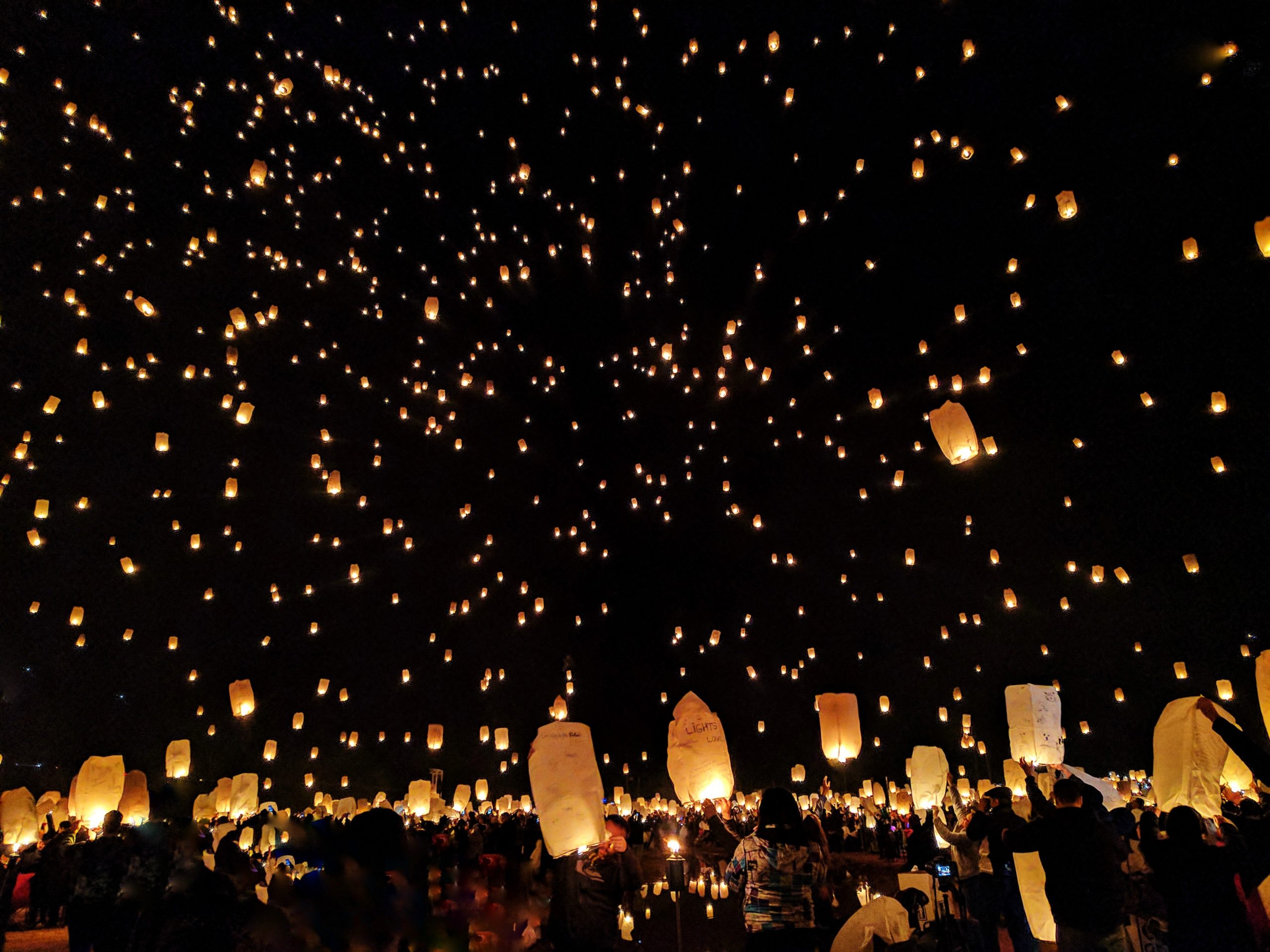 Hundreds of sky lanterns released into the night as part of the Festival of Lights