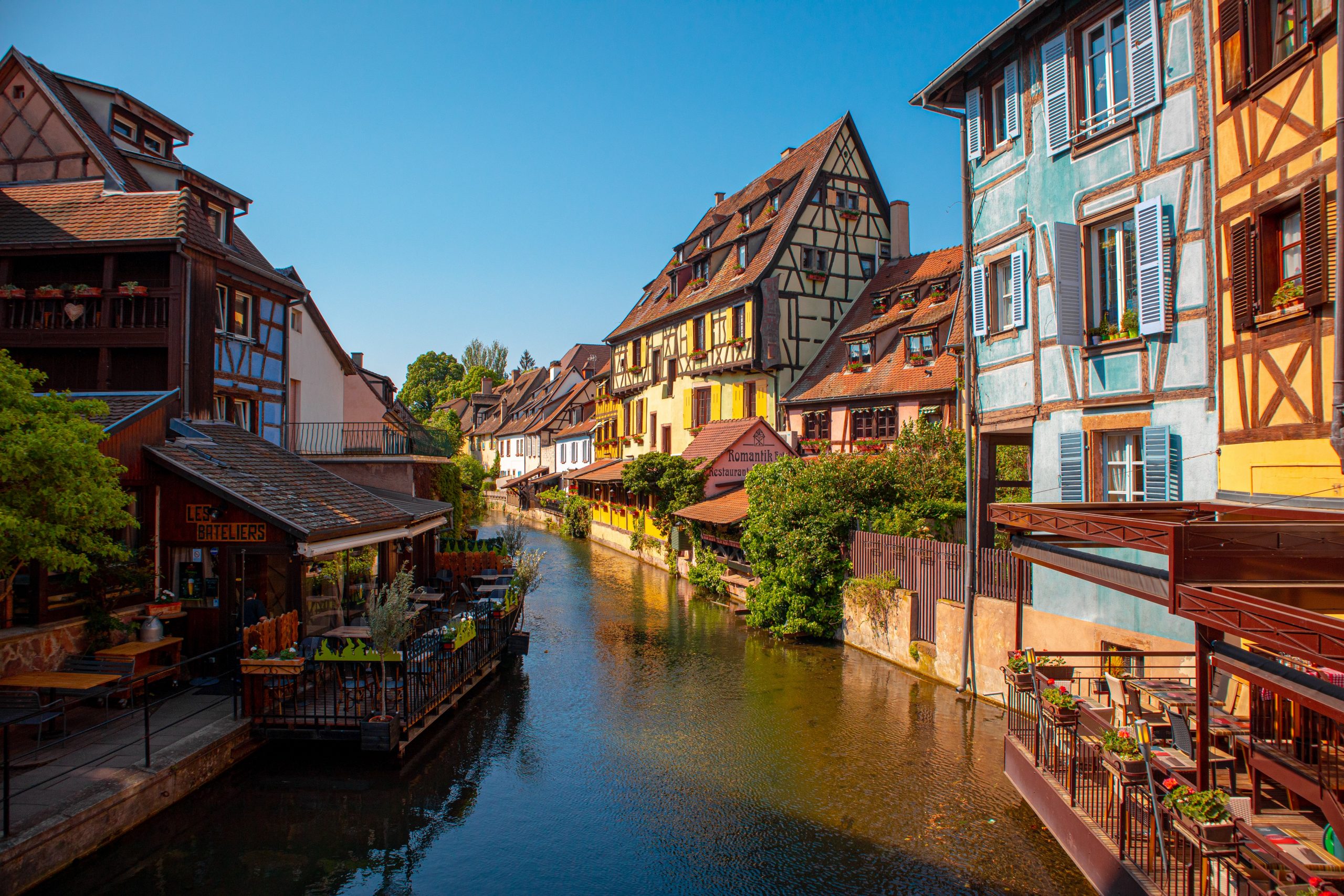 A river view of Strasbourg, France, on a sunny day