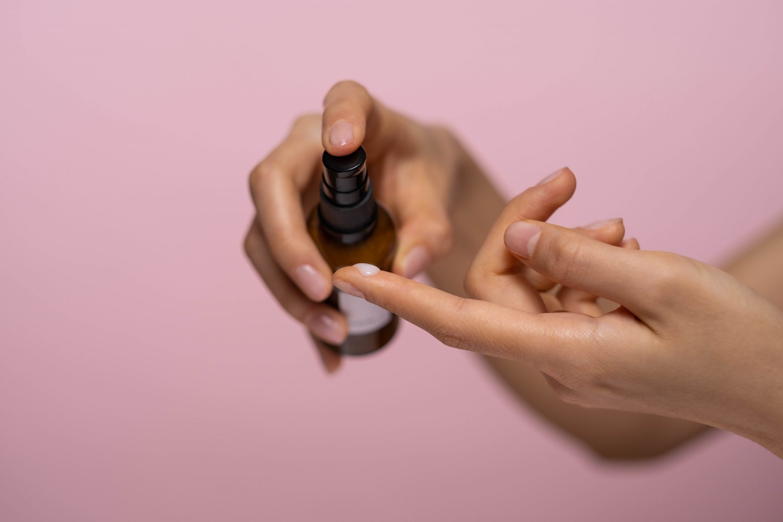 A woman samples organic cosmetics on her hands