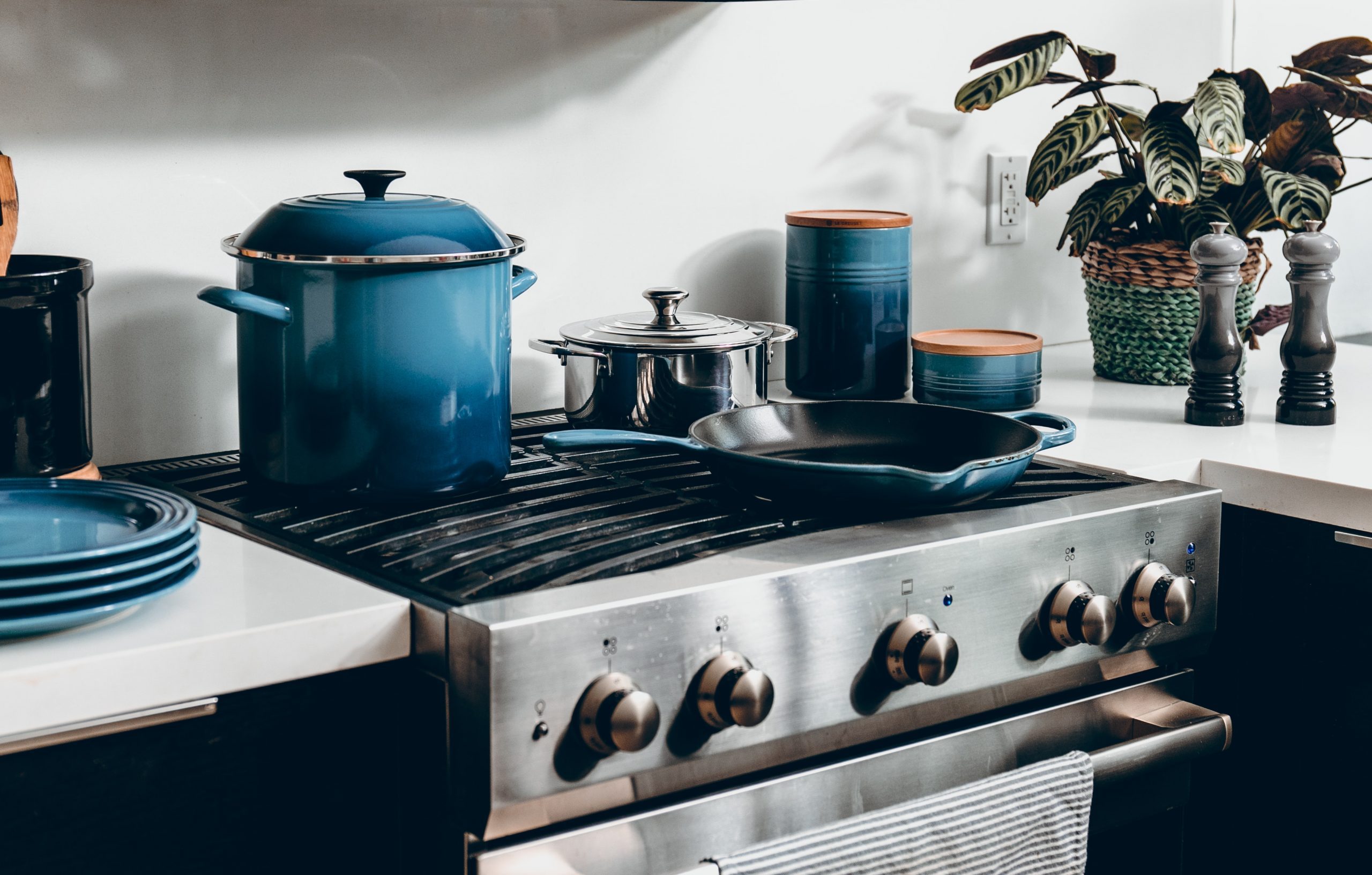 A selection of Le Creuset kitchenware in a kitchen