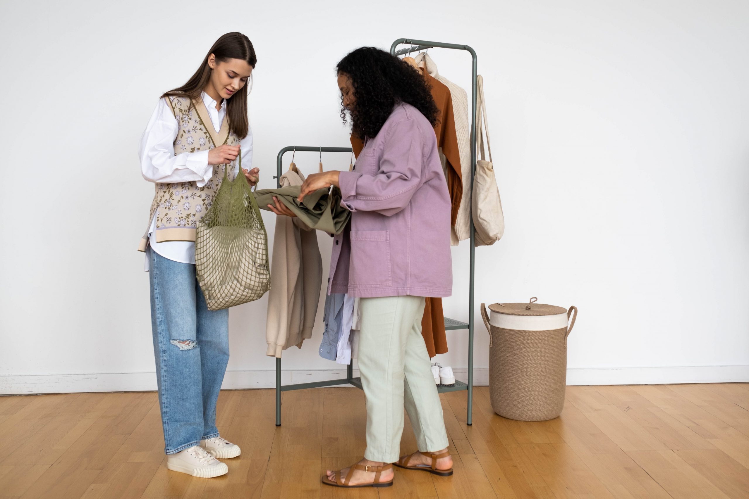 Two women shopping from sustainable companies.