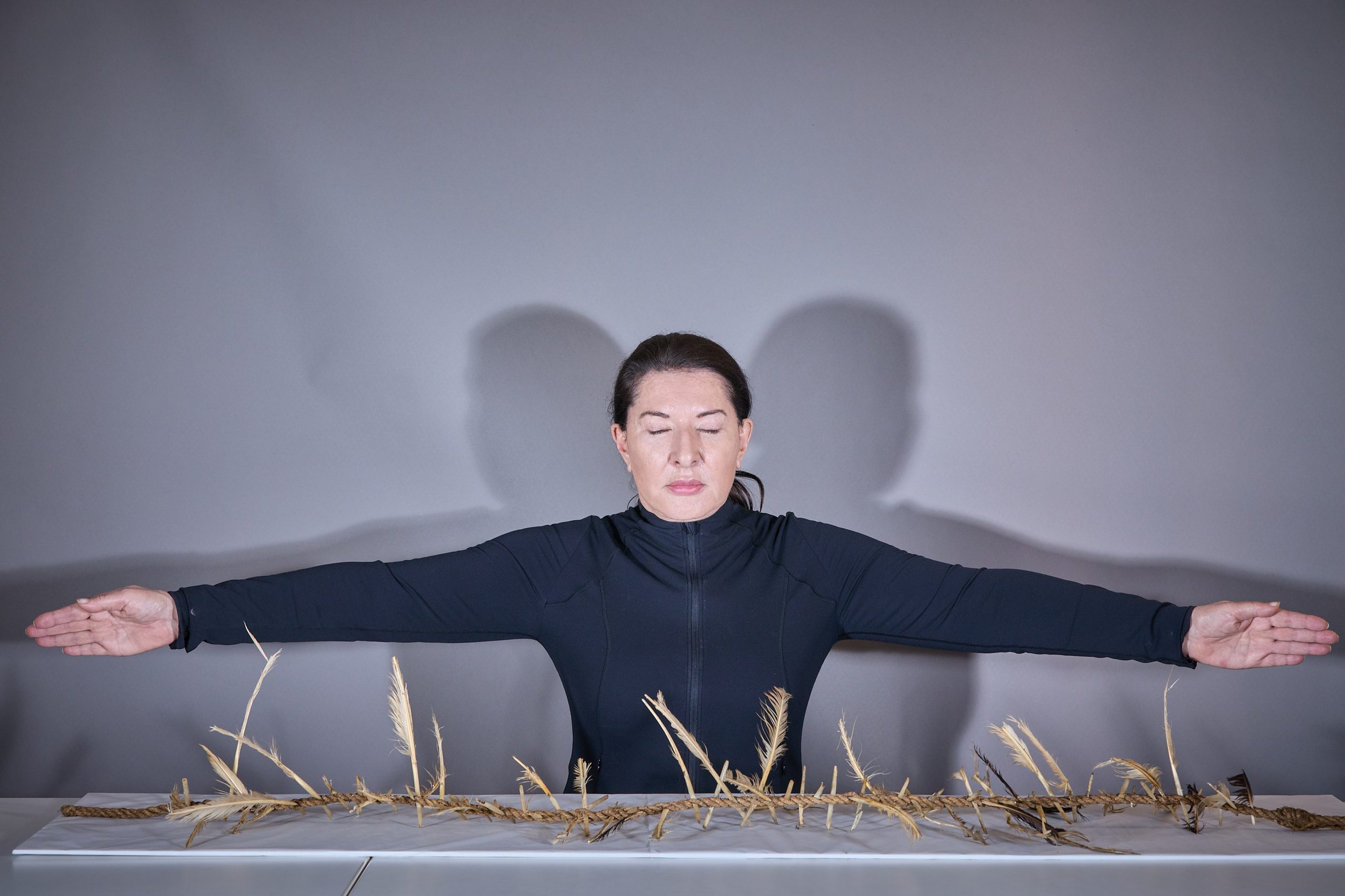 Performance artist Marina Abramović performs on stage with a ‘Witches’ Ladder’ in 2021.