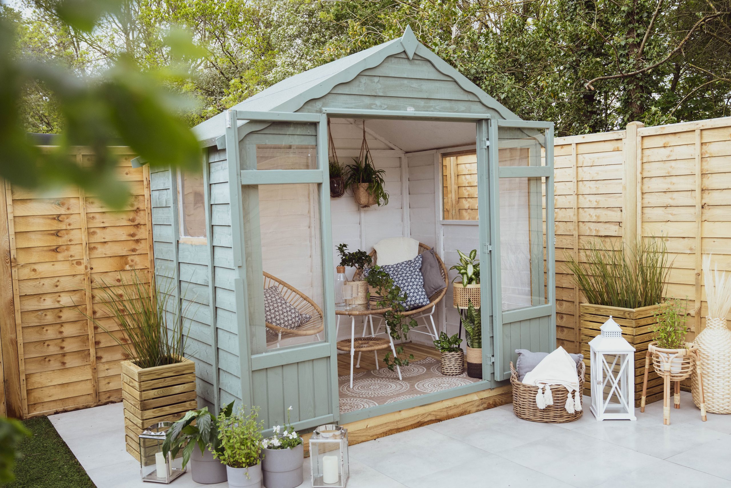 At the bottom of the garden, a Forest Oakley Summerhouse from shedstore.co.uk.