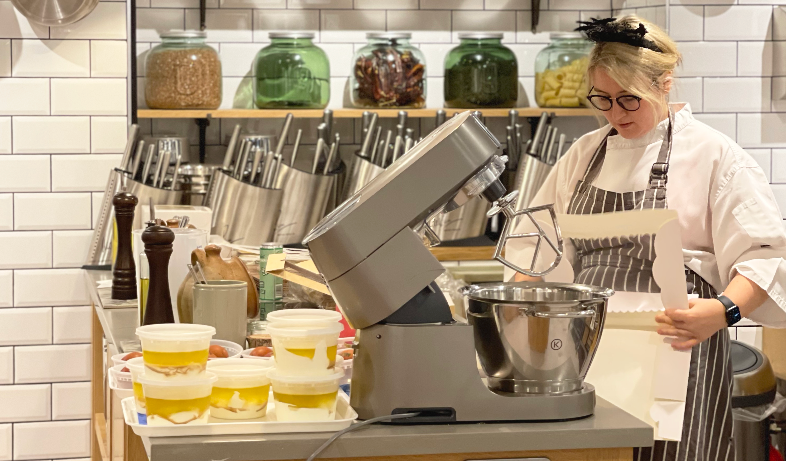 A female chef demonstrates the art of baking at The Langham, London.