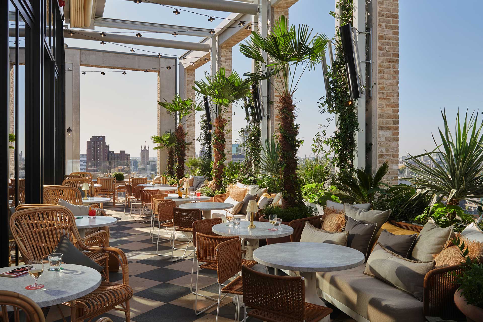 The dining area of Seabird's restaurant with views of the London skyline.