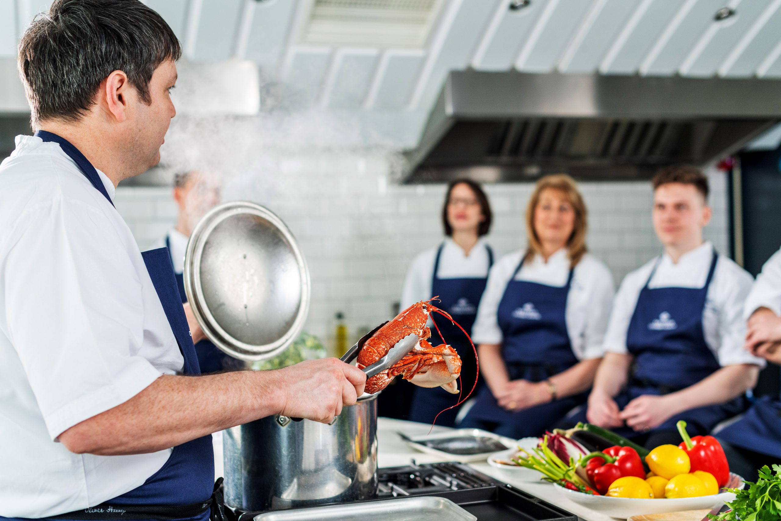 Head Chef Nick Evans from  Rick Stein's Cookery School demonstrating how to cook lobster.