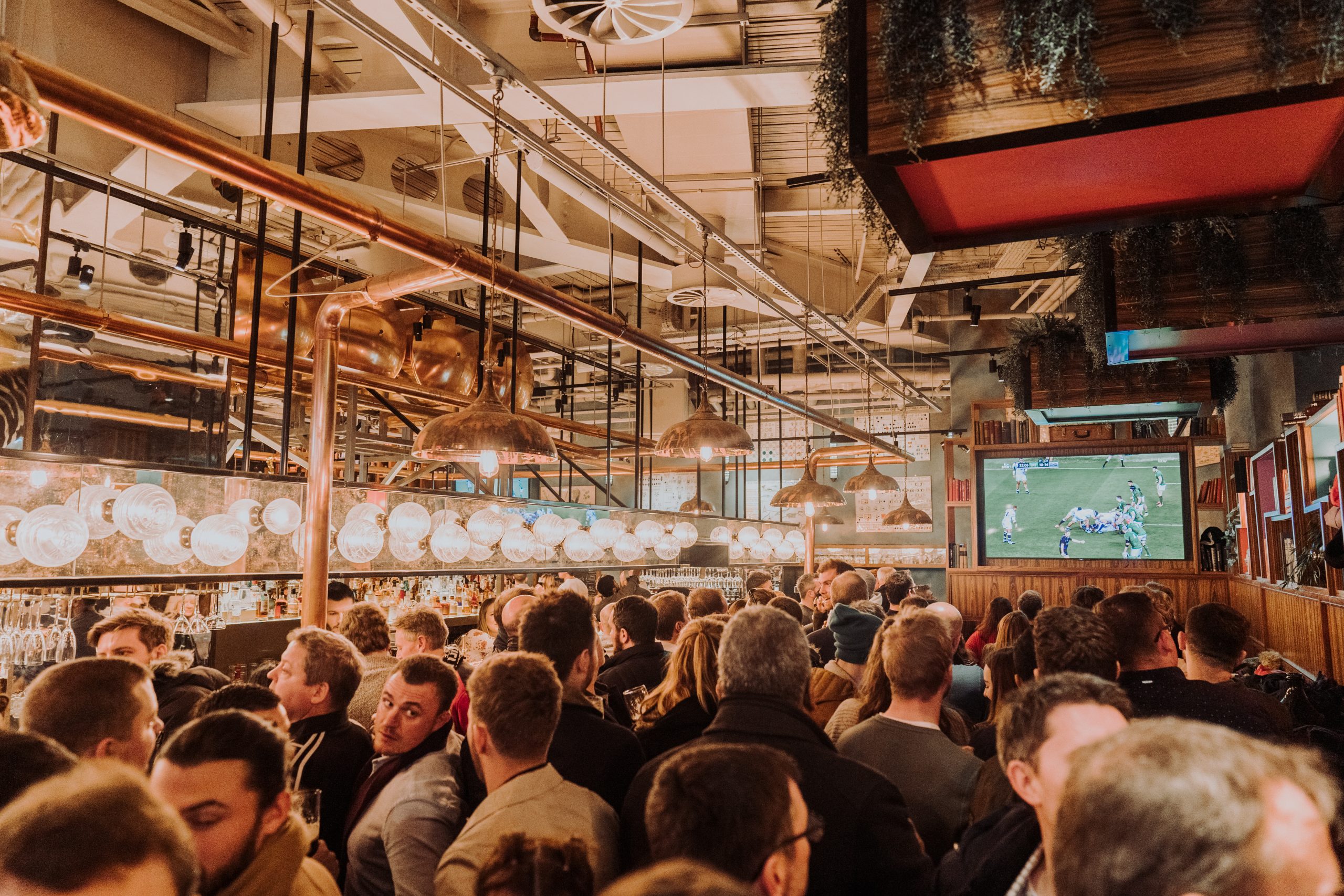 Crowds packed to see the football match at Greenwood, Victoria.