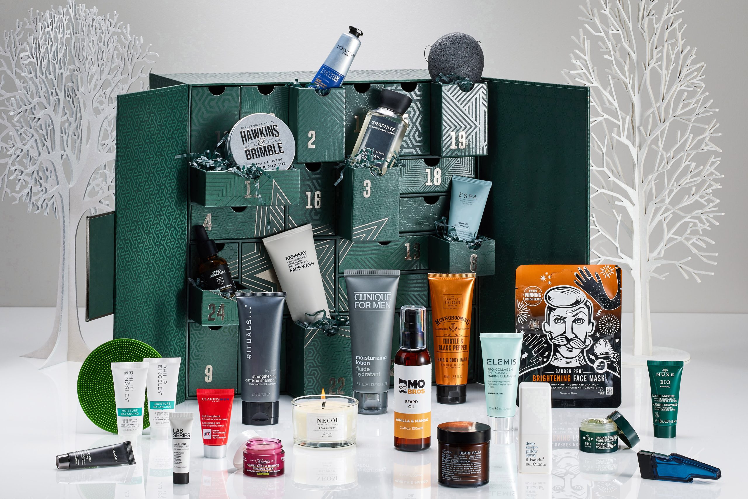Next's 25 Days of Grooming advent calendar with all the products found inside on display.