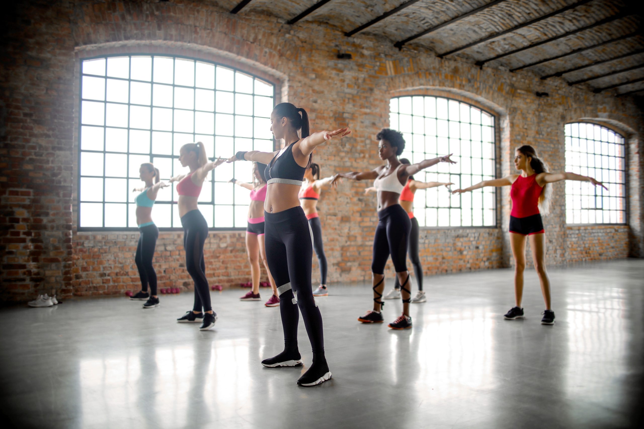 A dance class in a well-lit studio.