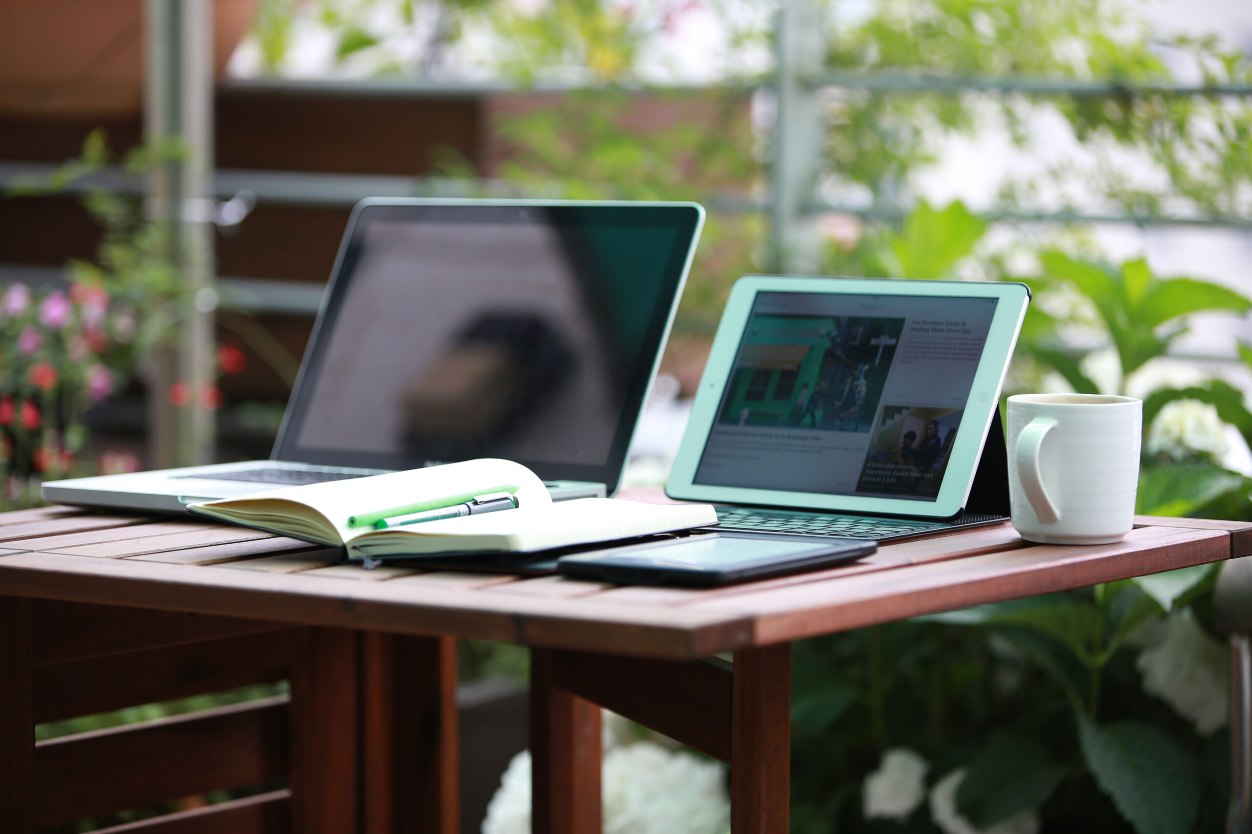 Laptop and tablet on table 