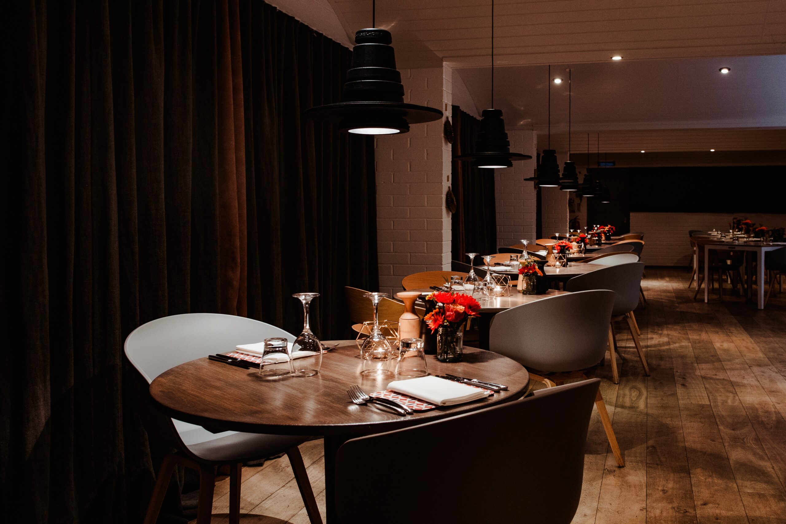 Dining tables in fancy hotel restaurant