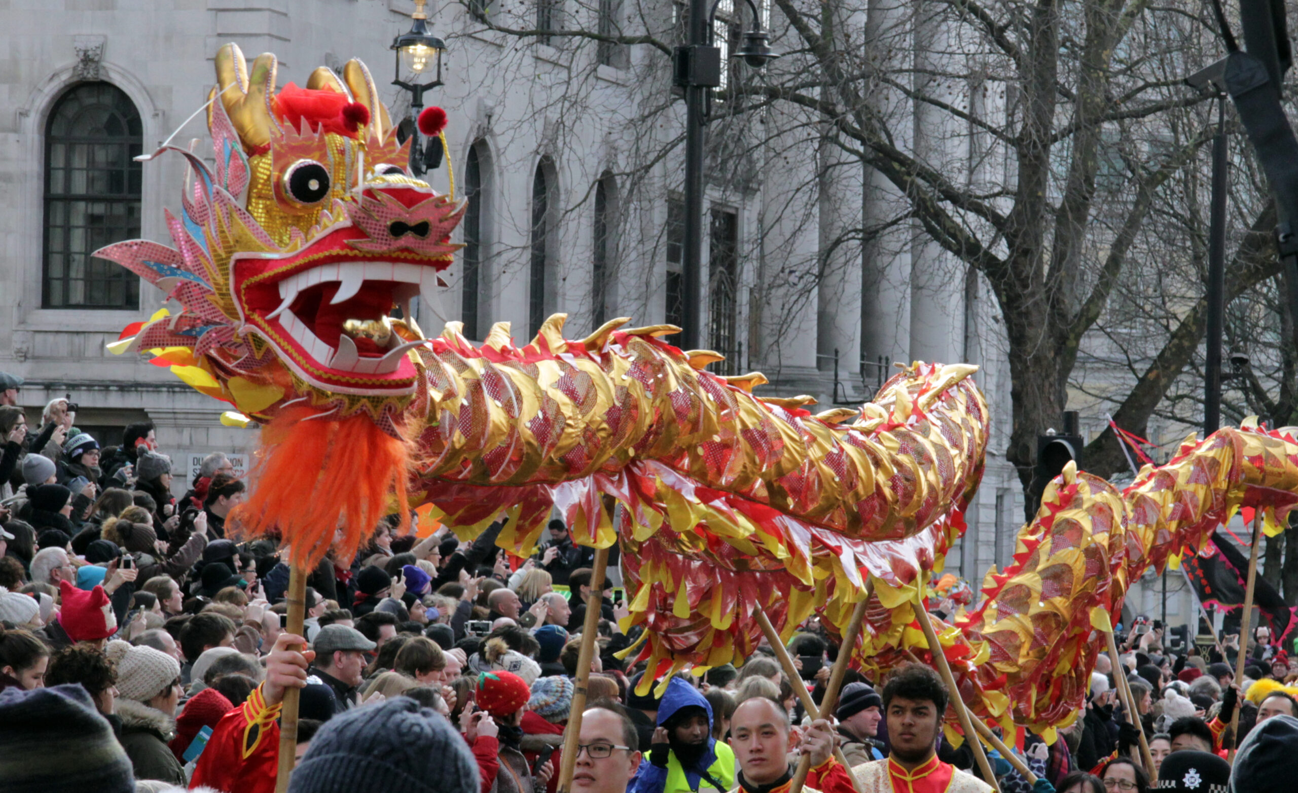 A colossal cloth dragon weaves its way through the crowds at London's Trafalgar Square as part of the Chinese New Year parade.