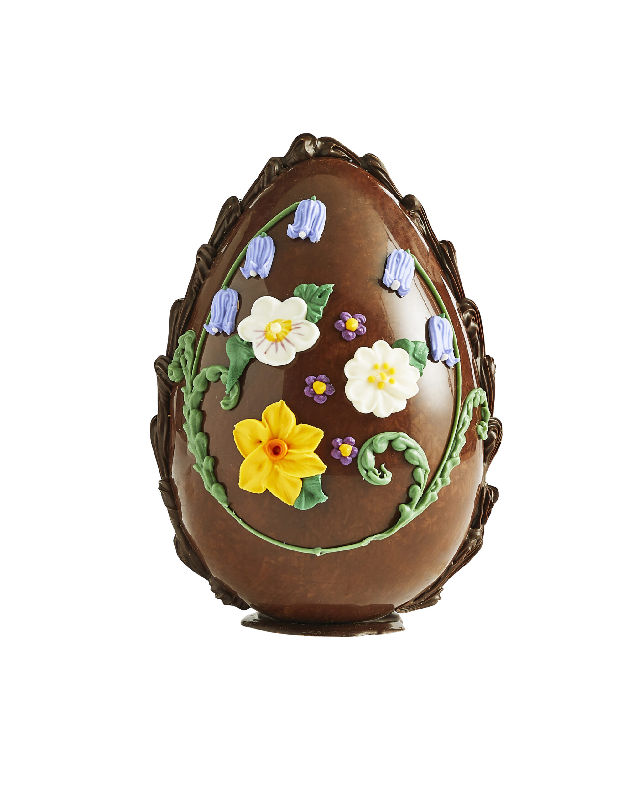 A hand-decorated chocolate Easter egg against a white background.