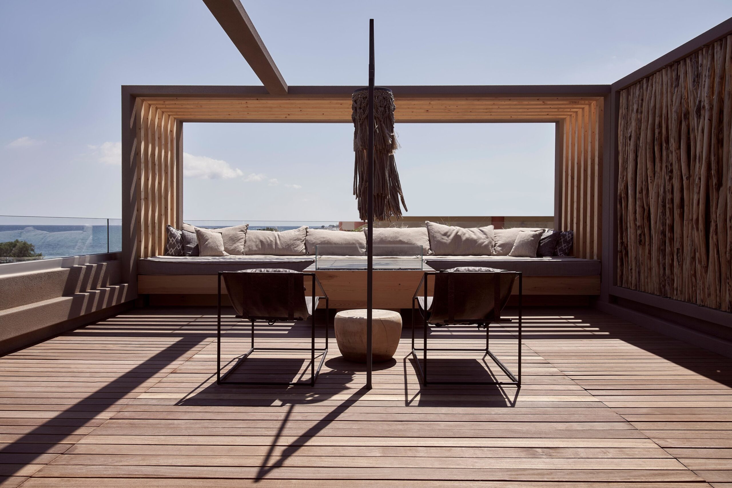 Wooden hotel terrace facing the sea