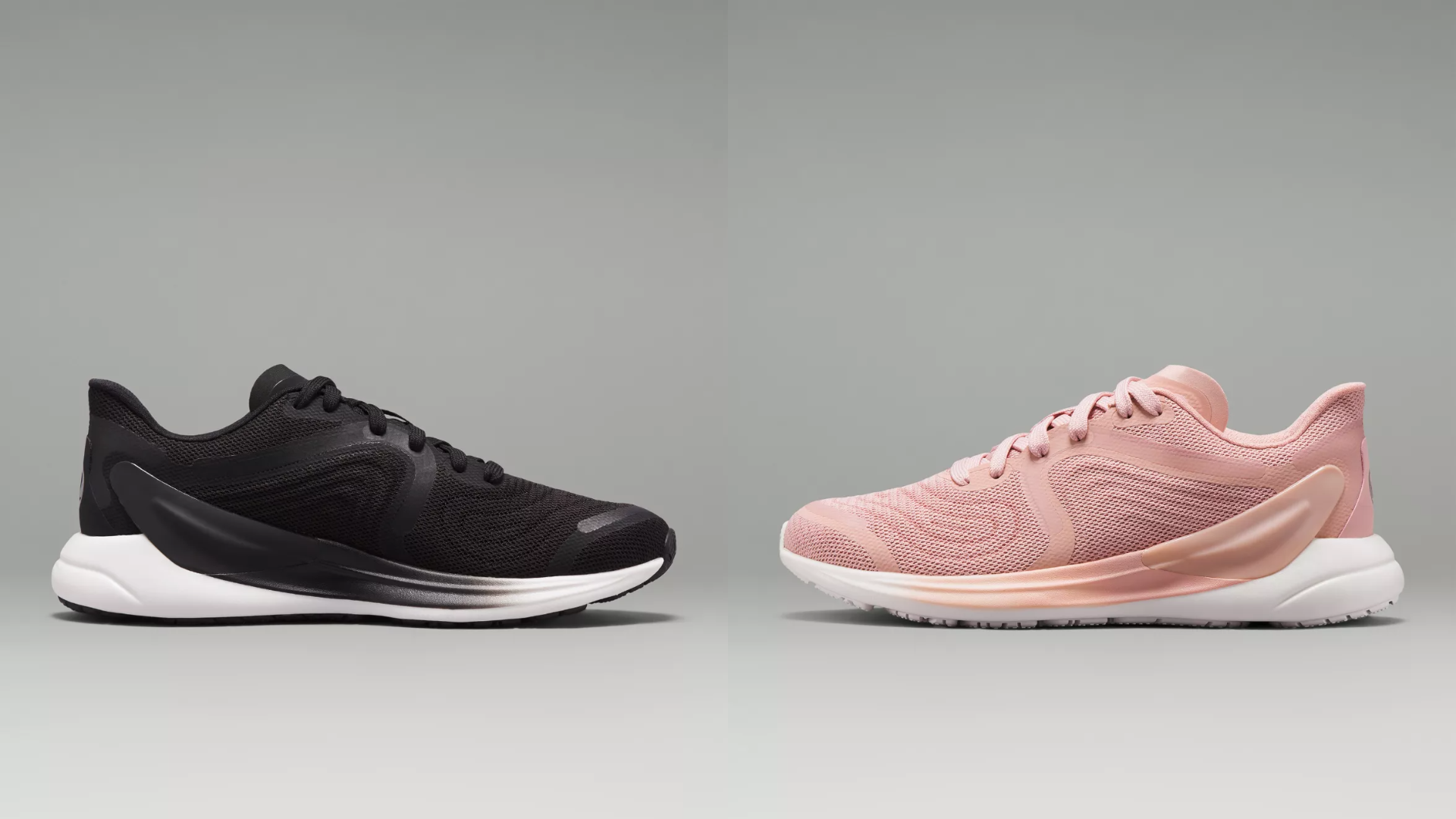 A black and pink Blissfeel 2 Women's Running Shoe face each other