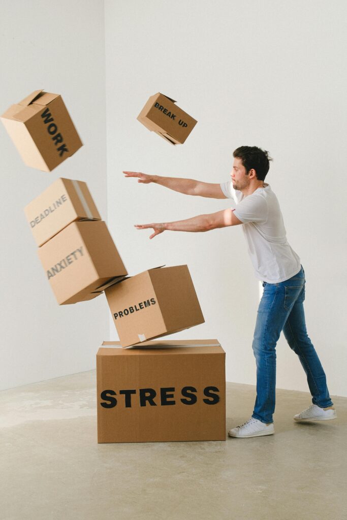 man struggling to manage stress, work and anxiety