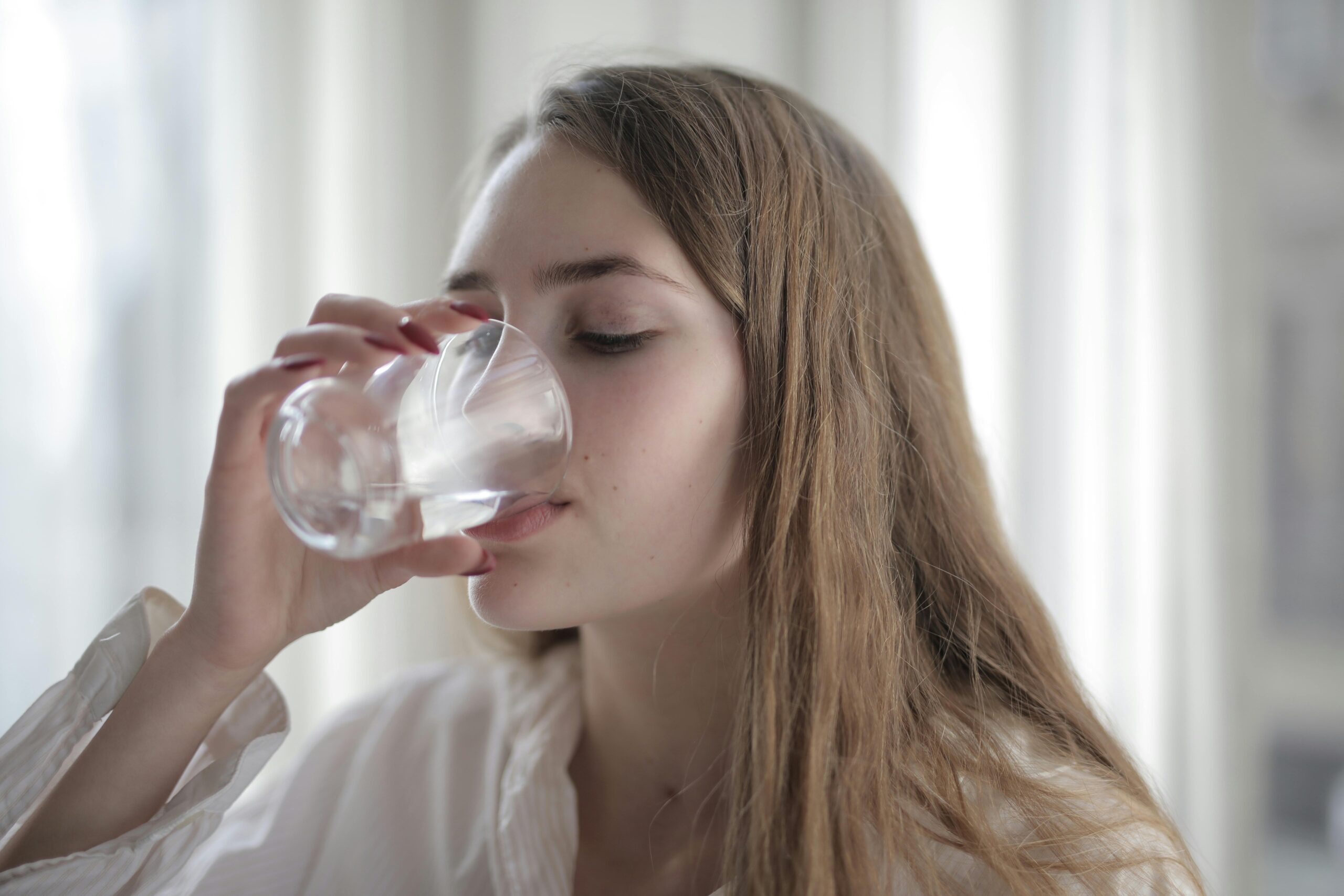 Woman drinks water