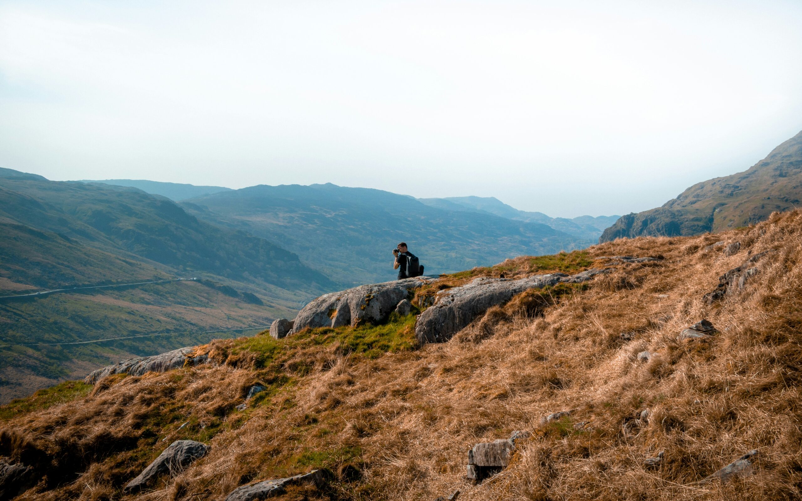 man hiking through snowdonia