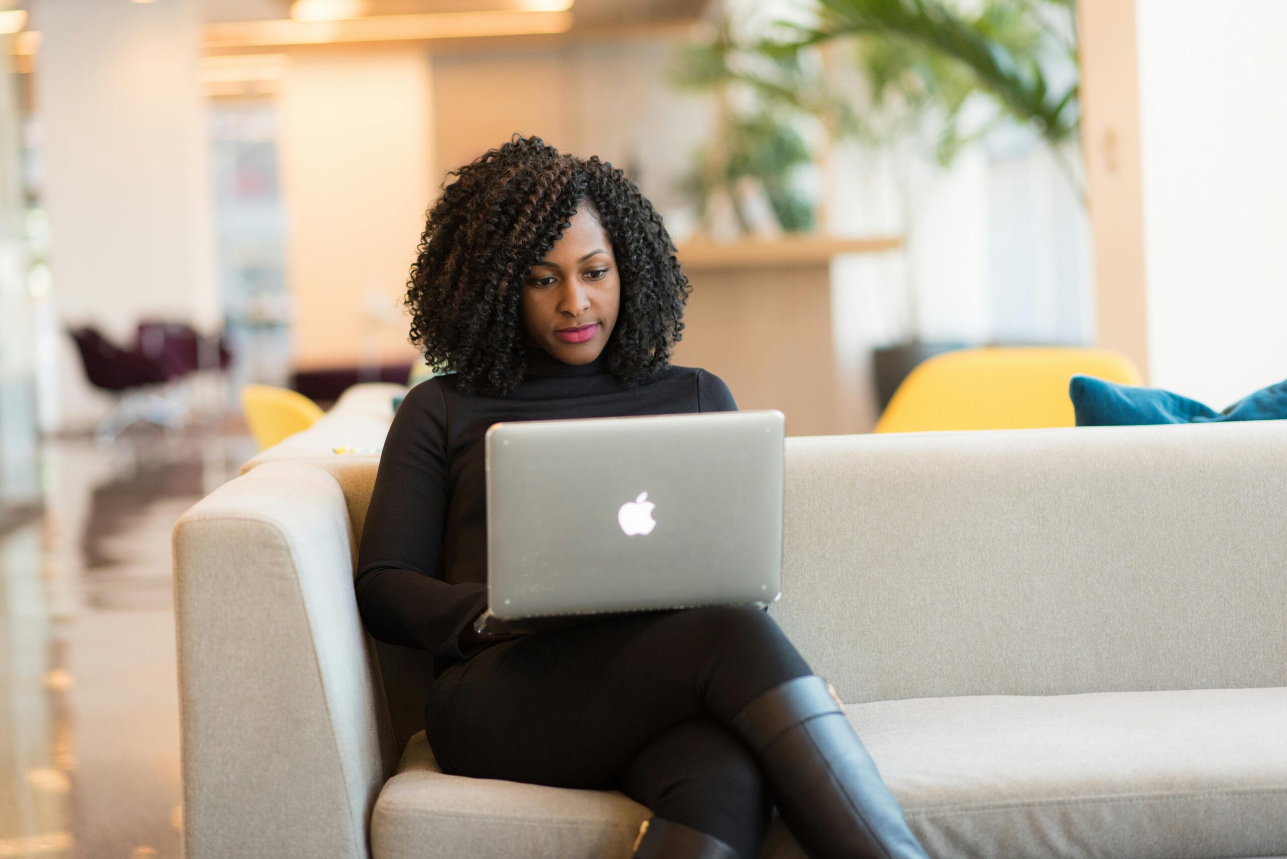 Woman works on her laptop