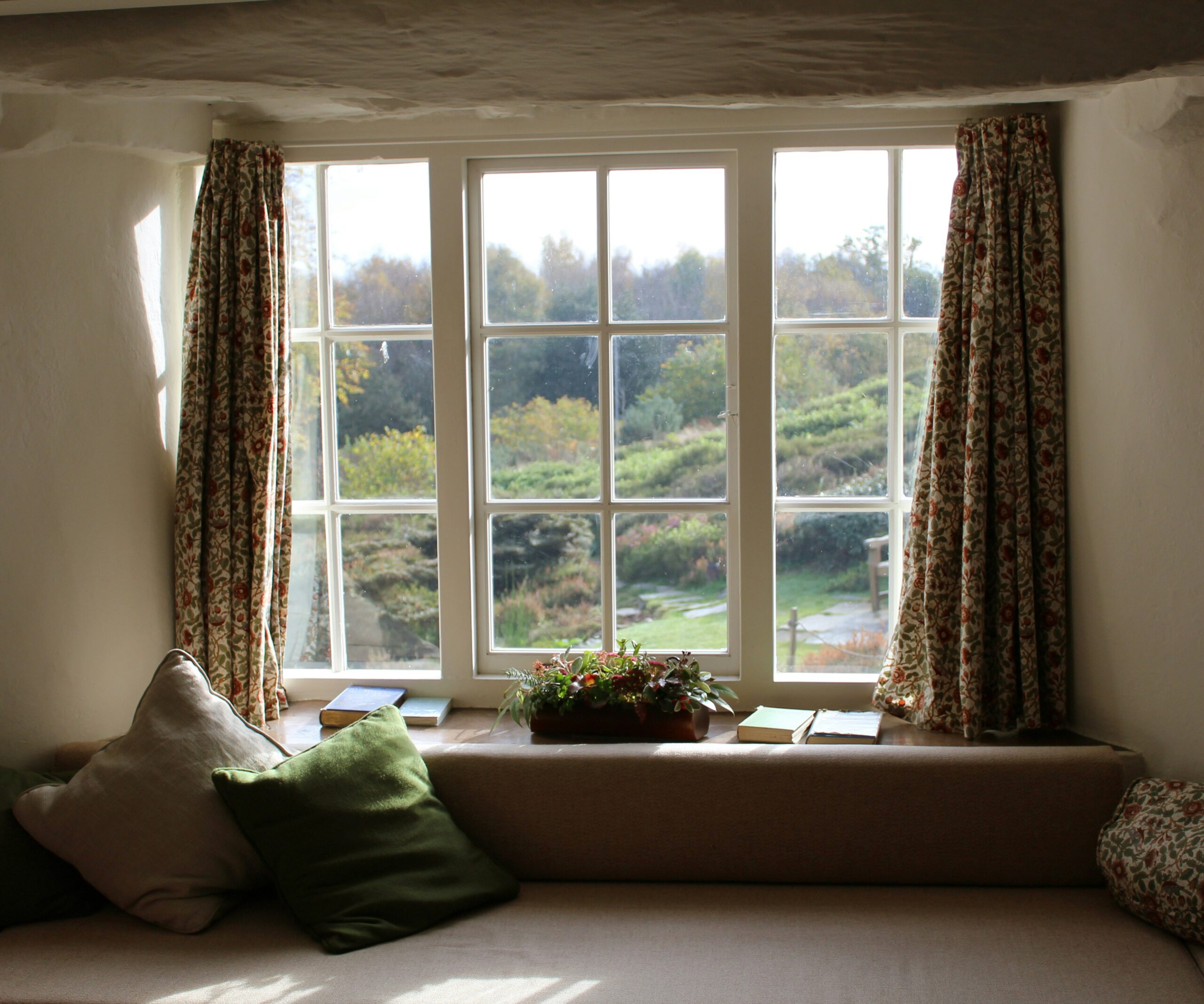 Open window with autumn colours outside