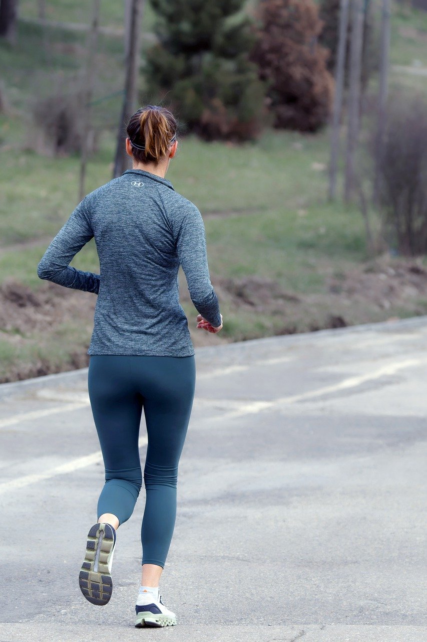 Woman running in winter gear