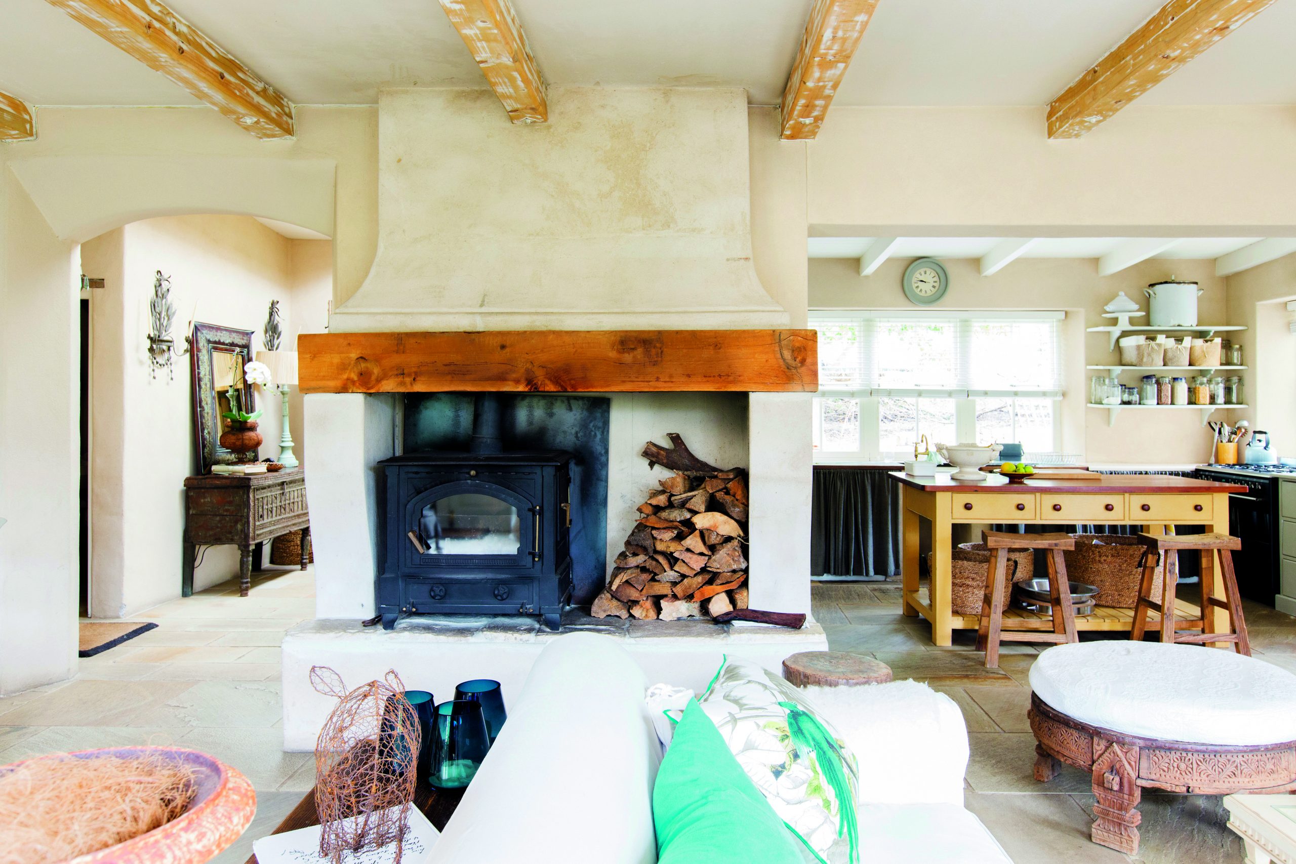 The clever use of reclaimed oak furniture can give a space the look a cottage.