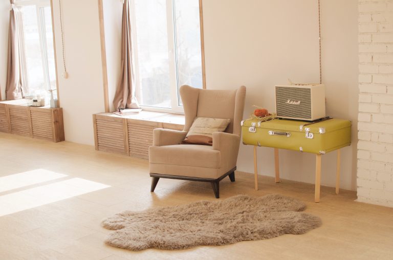 A modern living room featuring a suitcase coffee table.