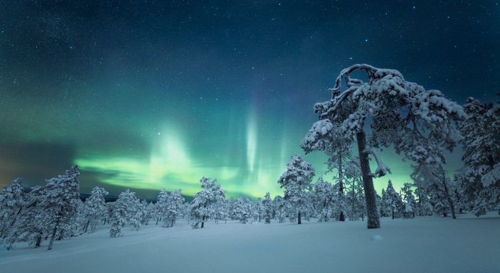 The Aurora Borealis in the night sky in Finland.