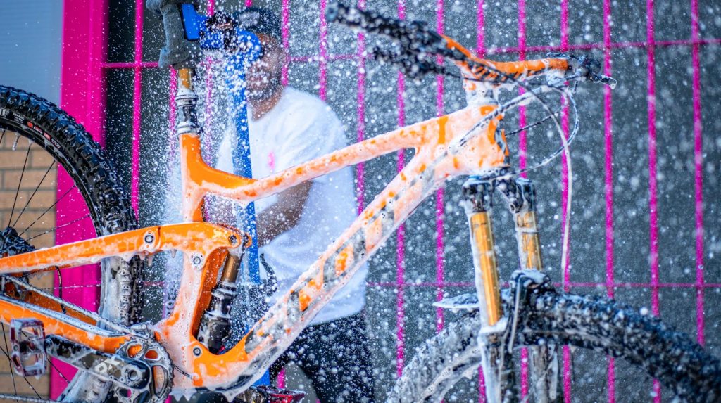 Muc Off Pressure Washer being used on a bicycle