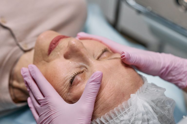 A woman undergoing laser skin treatment