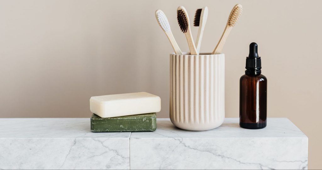 A range of eco friendly products - soaps, toothbrushes and perfume.