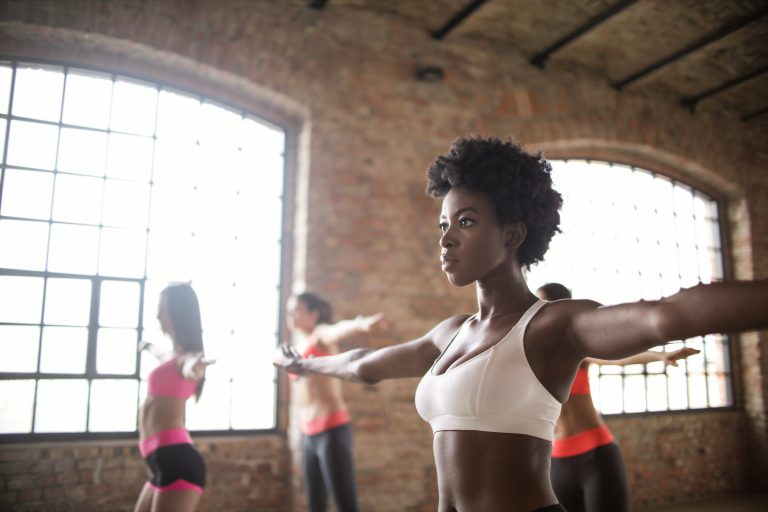 Women keeping fit in a stretching studio