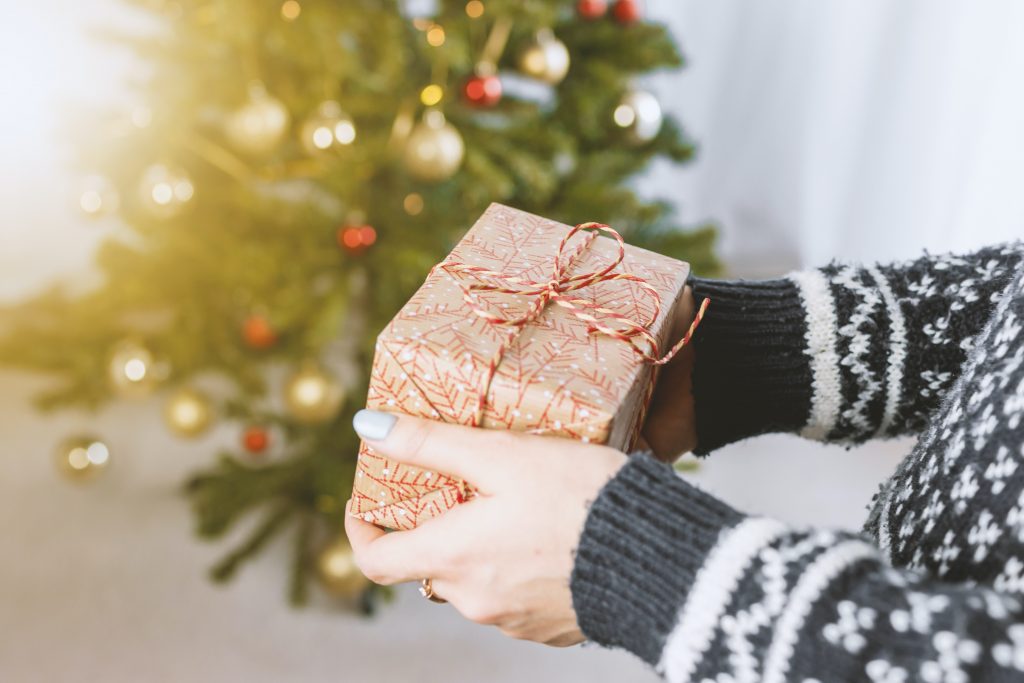 Discovering a present under the Christmas tree