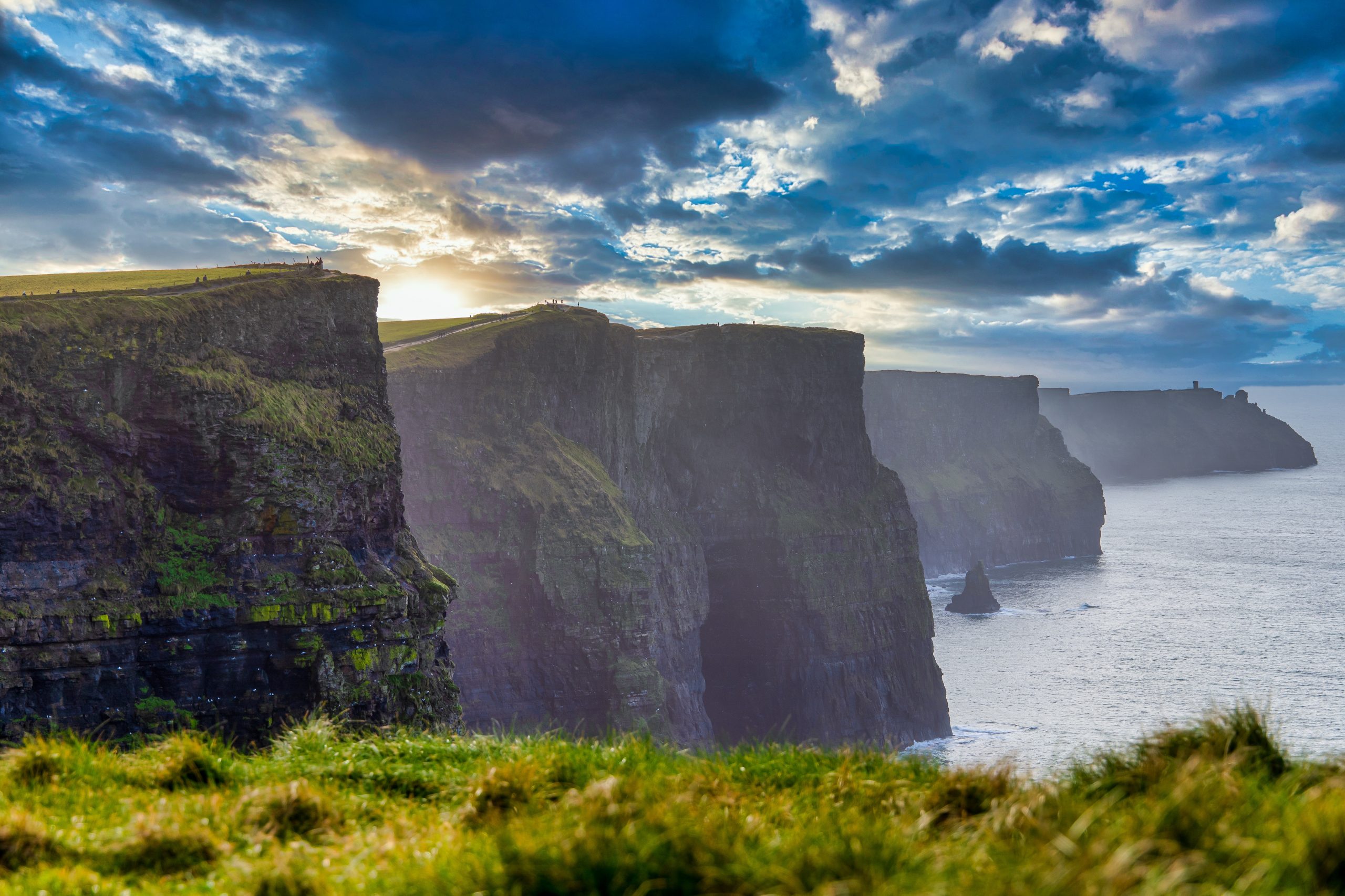 The sun rising on the Cliffs of Moher, Ireland.