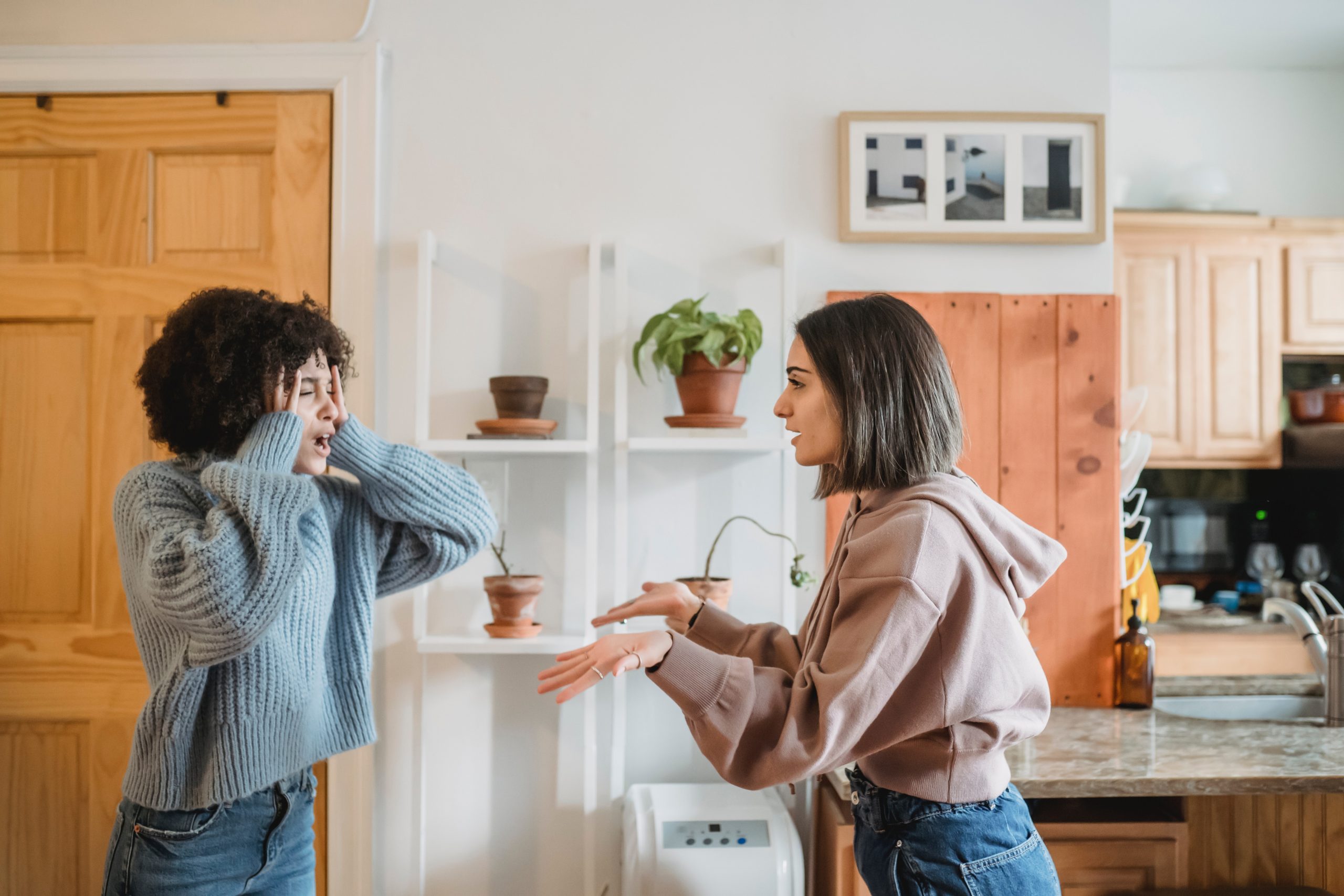 A woman argues with a colleague over her rights.