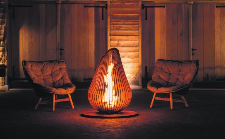 An indoor firepit from Glowbus that resembles a giant candle flame.
