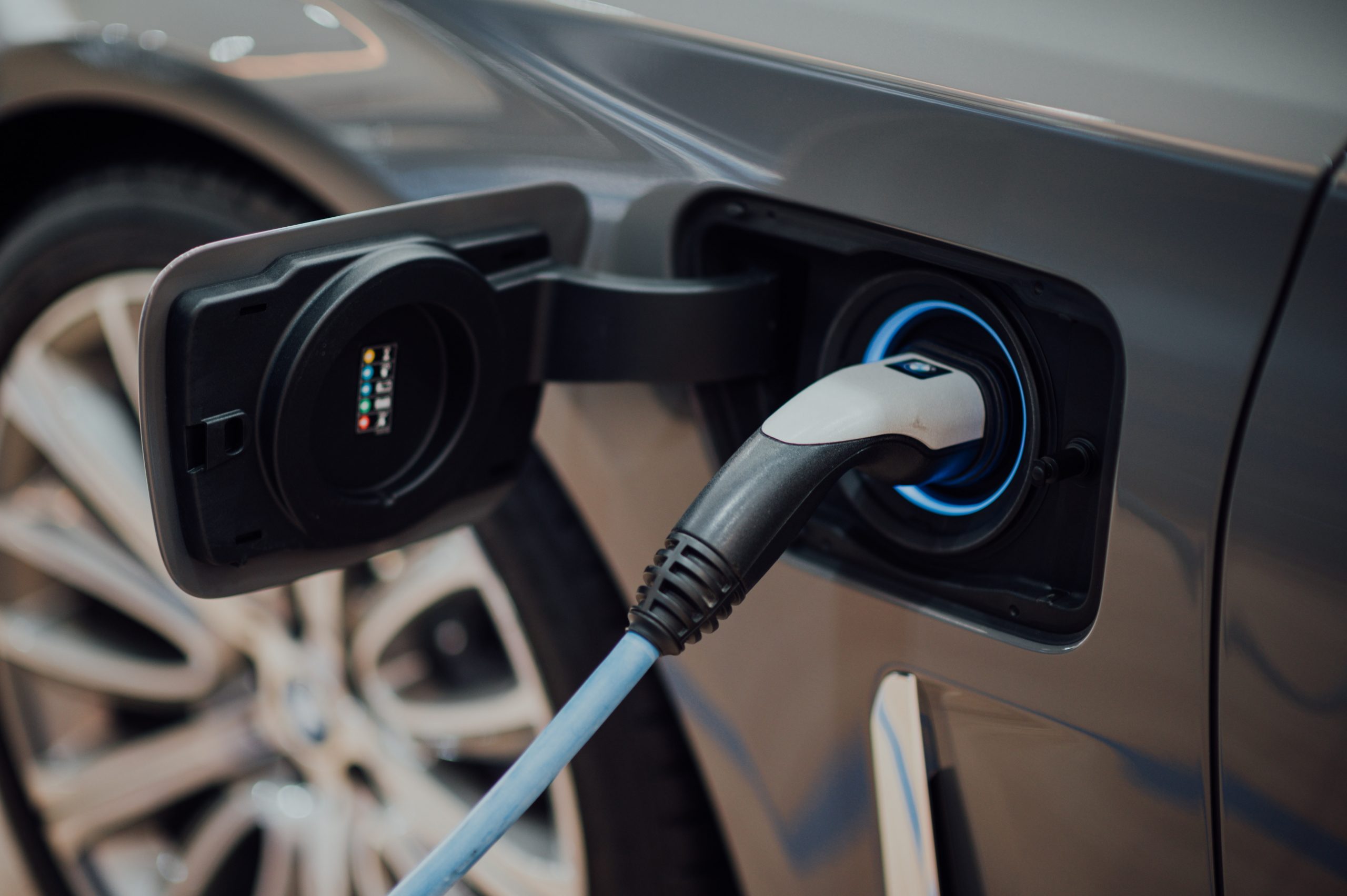 An EV charger charging a car.