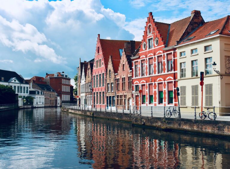 Colourful houses and buildings by the river in Bruges