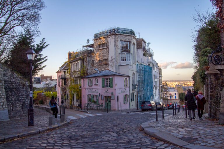 The picturesque pink maisonette restaurant, La Maison Rose, serves traditional French cuisine in Paris France.