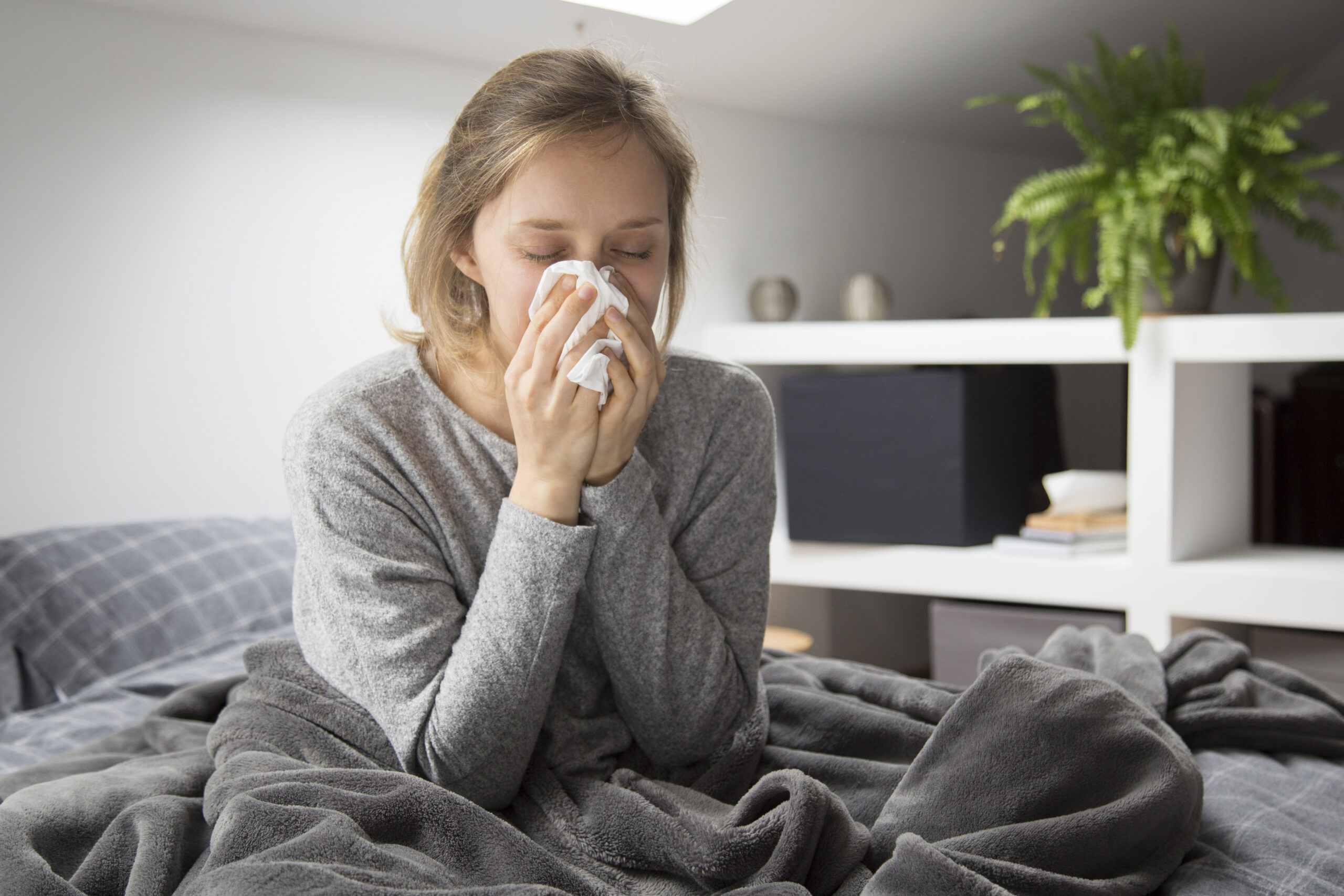 Sick woman in bed