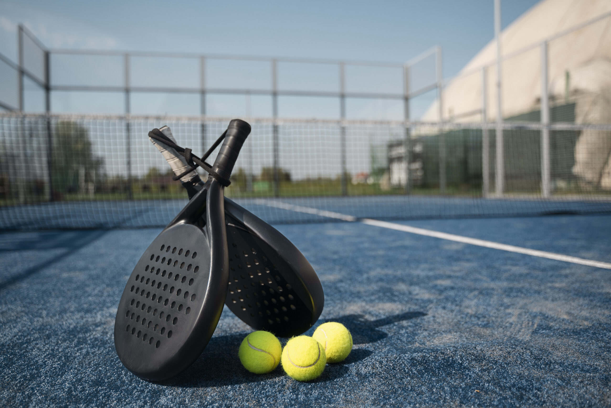 Padel rackets on a court