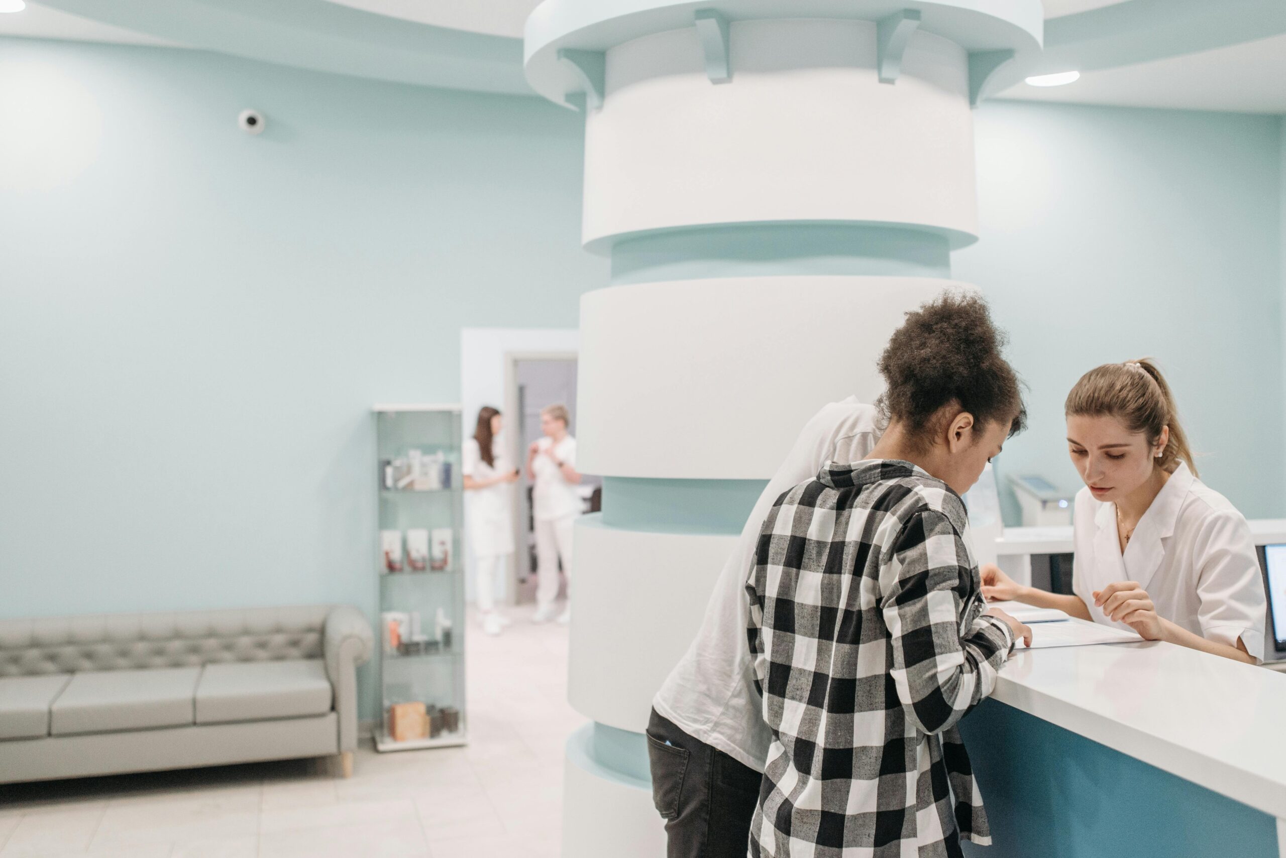 woman waiting to be seen at a clinic