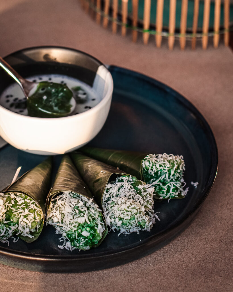 Plate with Thai dessert, cones with coconut inside