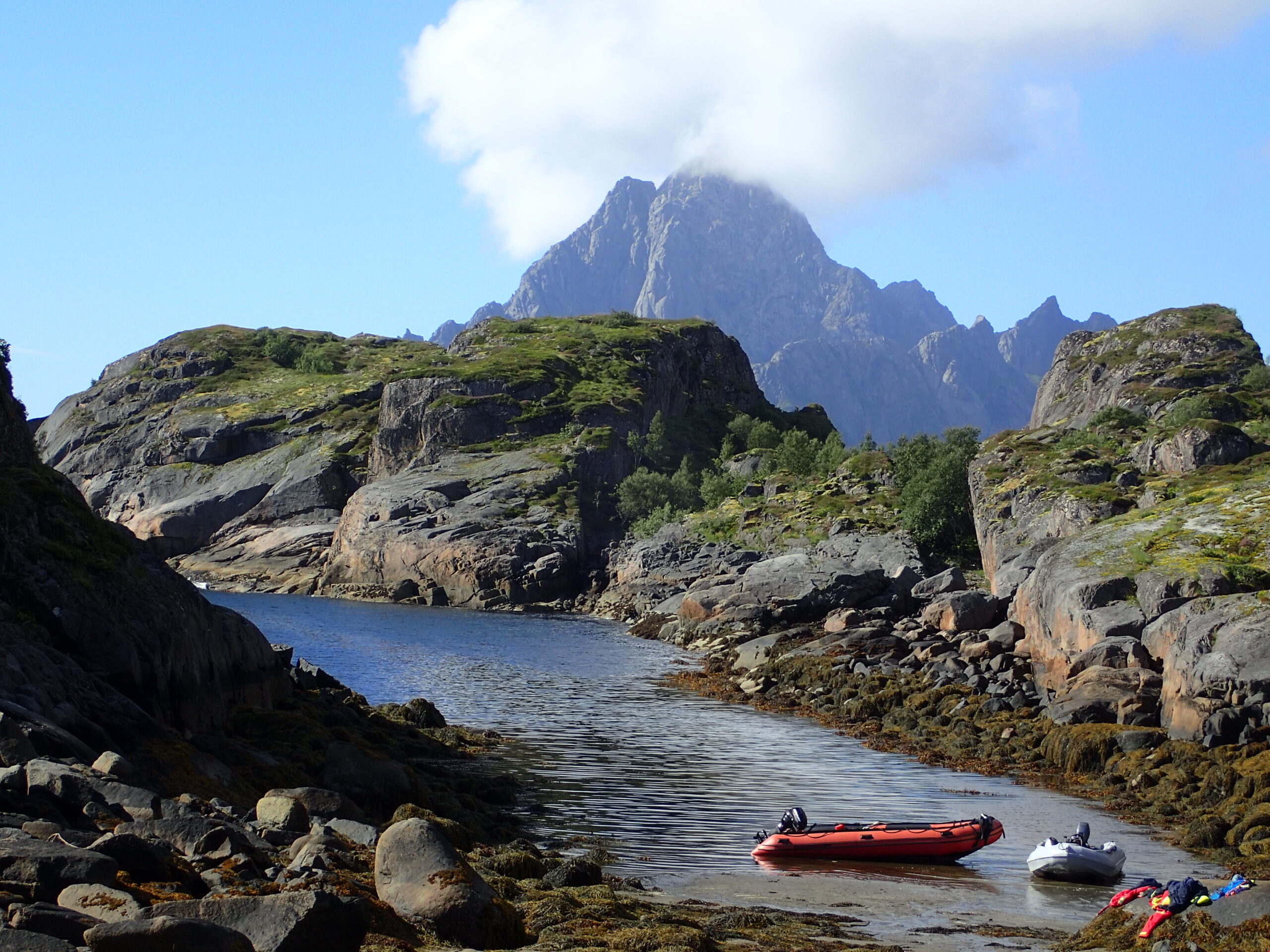 Lofoten Fjords in Norway with river, kayas and mountains behind