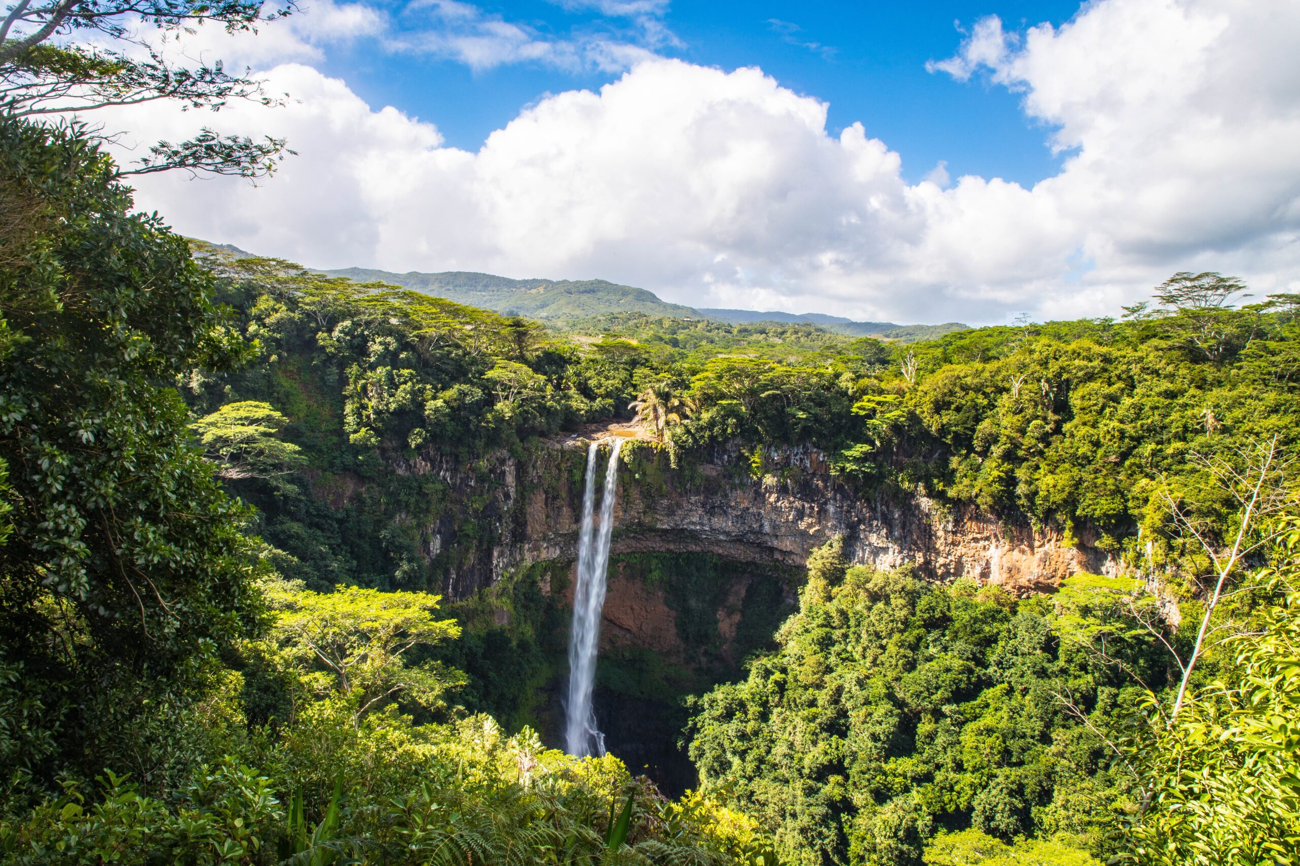 A beautiful scenery of Chamarel Waterfall in Mauritius under a cloudy sky