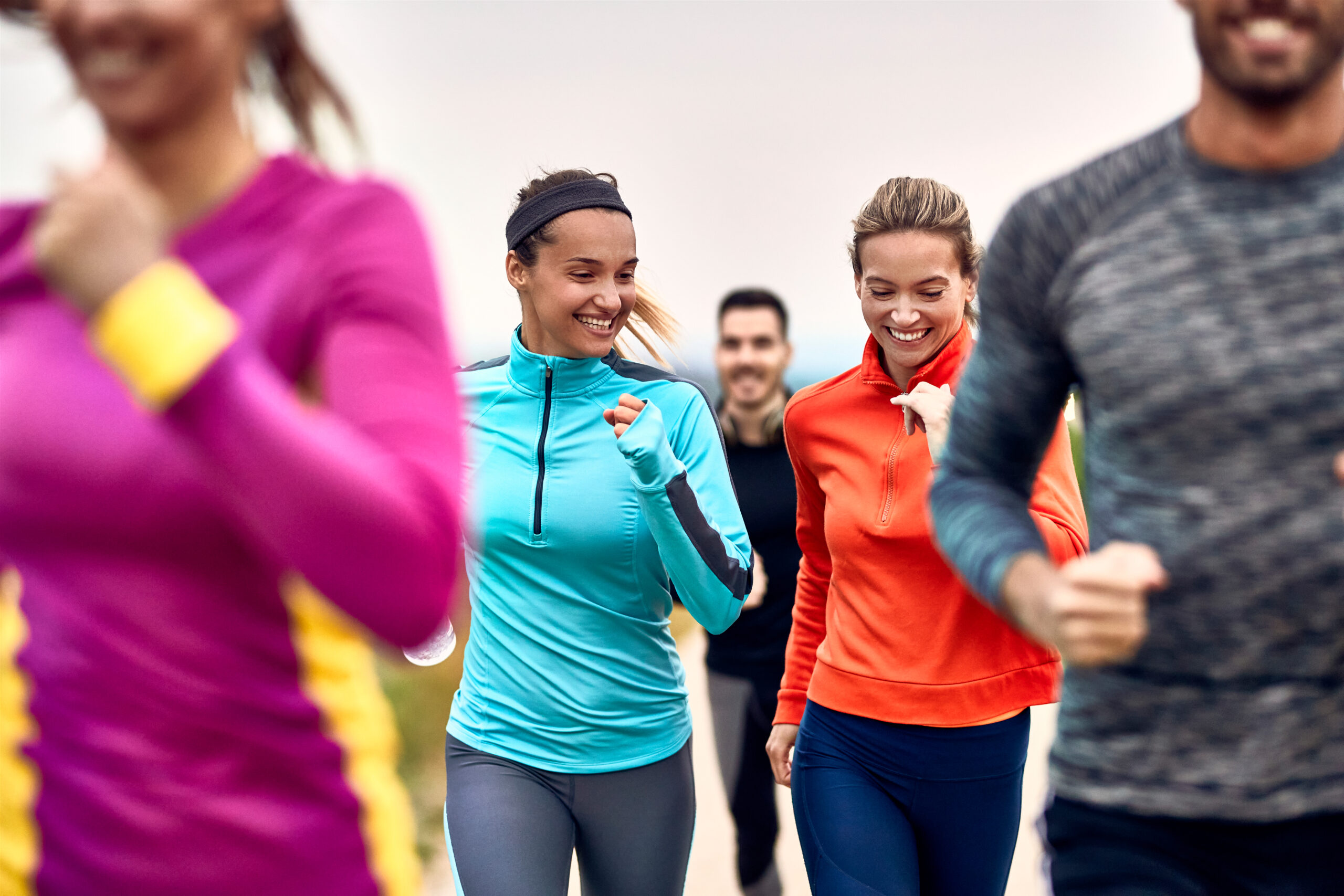 Happy female runners at a running club